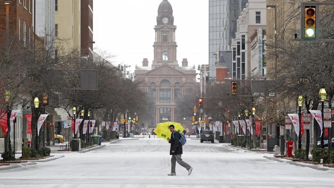 Downtown Fort Worth was quiet and mostly vacant on this Feburary day, when ice blanketed the streets. El Nino is expected to make for a wet North Texas winter in 2015-16.