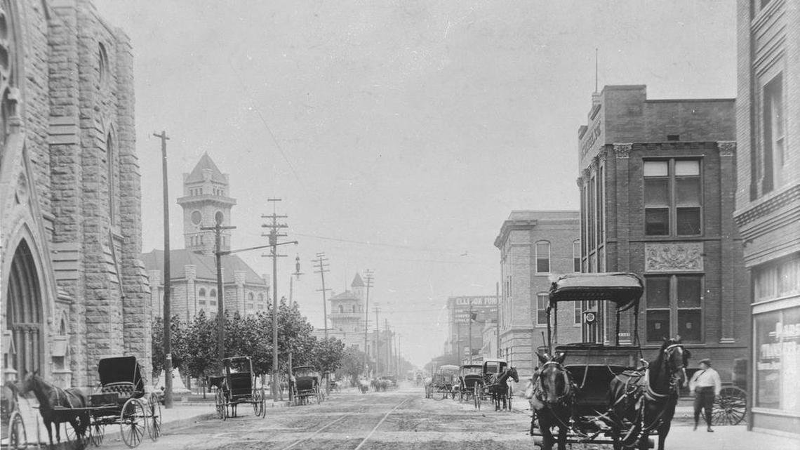 Downtown Fort Worth at Throckmorton and 11th Streets, with St. Patrick's Cathedral, left, ca. 1899
