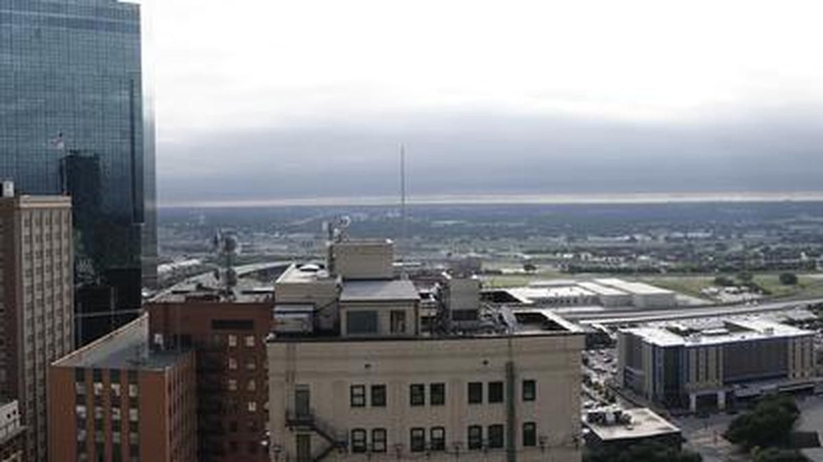The dark band of clouds on the horizon this morning are the outer bands of Tropical Storm Cindy that made landfall along the Texas-Louisana border early Thursday morning.
