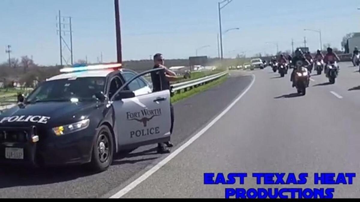 A Fort Worth police officer, later identified as W. Figueroa, deploys pepper spray toward motorcyclists who aren’t moving out of the inside lane after he pulled over a pickup on the Martin Luther King Freeway, Sunday, March 14, 2016. The video was shot by another motorcycle rider and posted on Facebook.