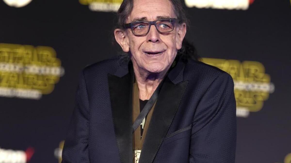 Peter Mayhew bid farewell to his fellow “Star Wars” actor Kenny Baker, calling him his “little friend with the giant heart.”