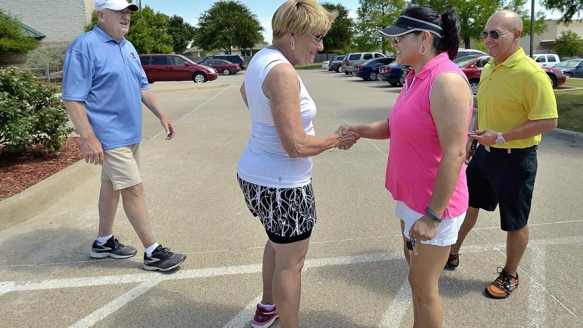 Following a nearby walking town hall, Fort Worth Mayor Betsy Price and District 7 Councilman Dennis Shingleton stop at Summerglen Branch Library to greet voters Joe and Rosie Calvillo.