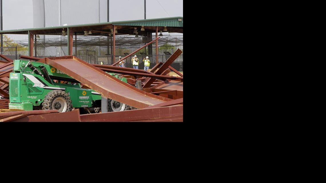 
Investigators survey the scene after a building under construction at Argyle High School collapsed.
