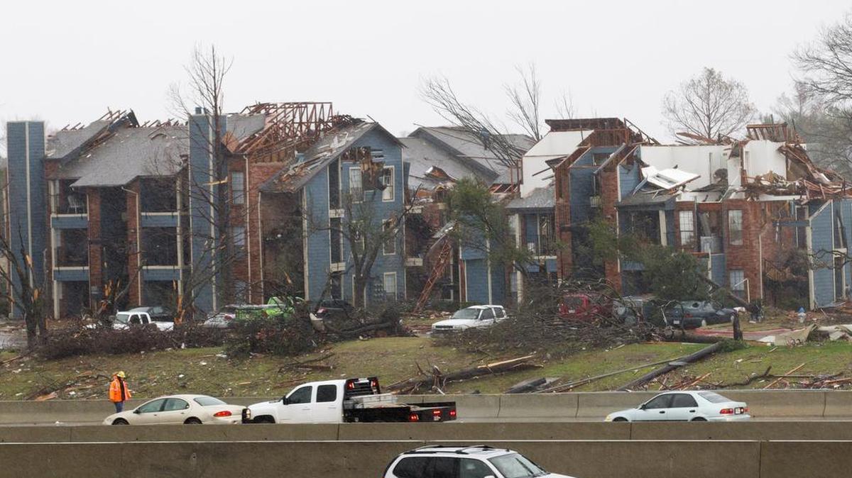 Damage from a tornado in Garland is visible from I30 on Sunday.