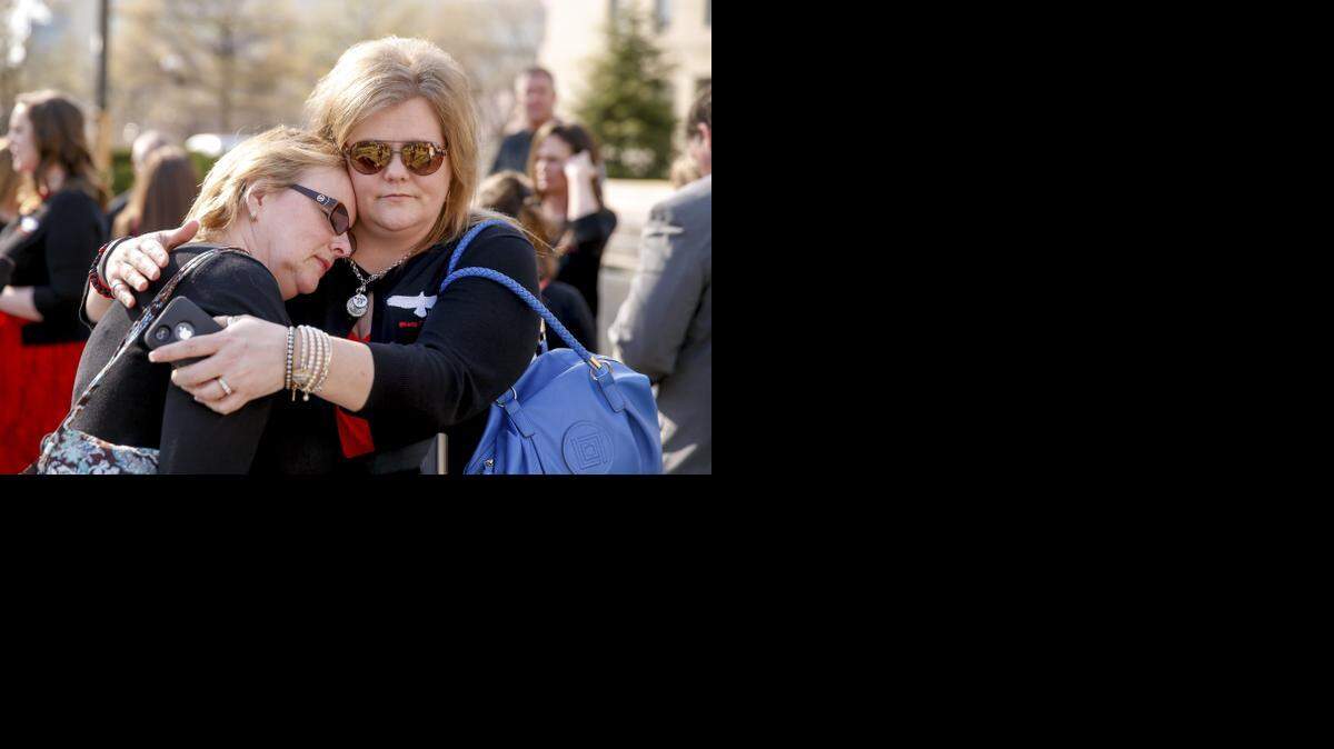 
Nicholas Slatten’s mother, Reba, left, is comforted after he received a life sentence.


