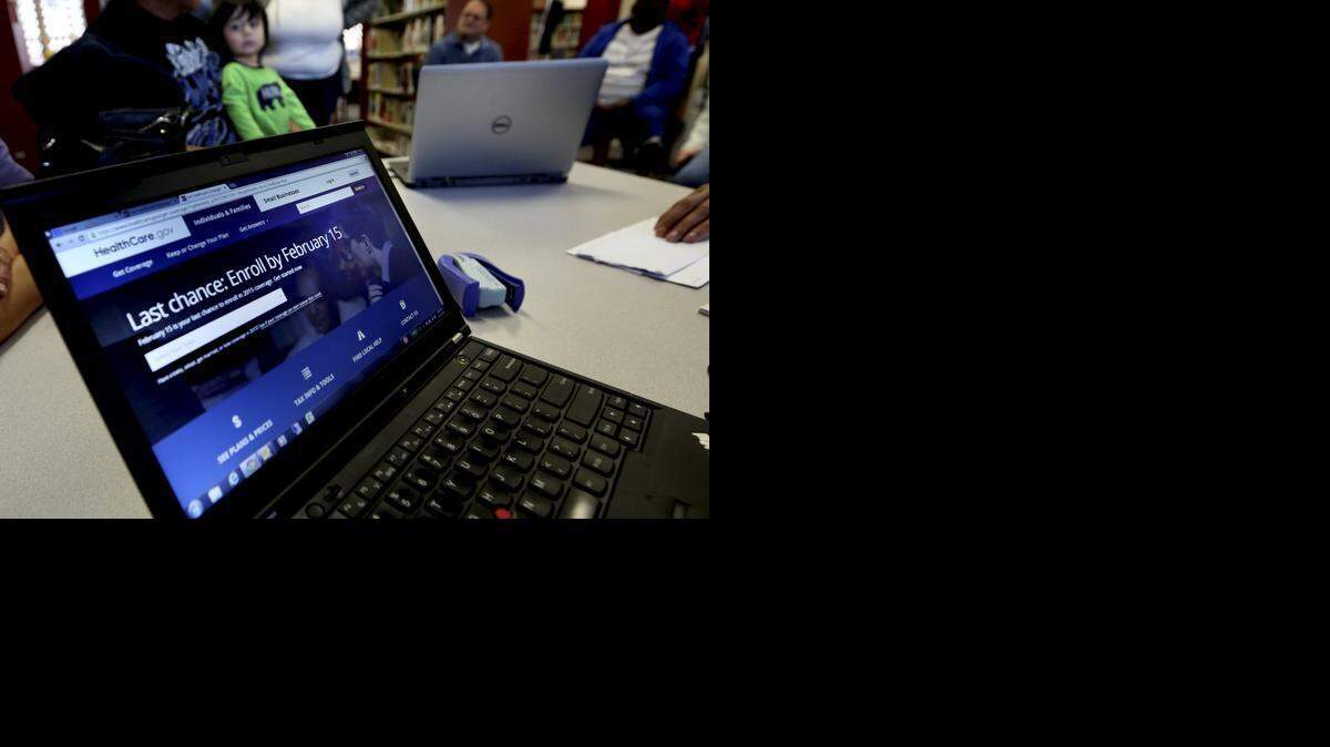 
A laptop shows the HealthCare.gov website during an Affordable Care Act enrollment event at the Fort Worth Public Library in Fort Worth. 
