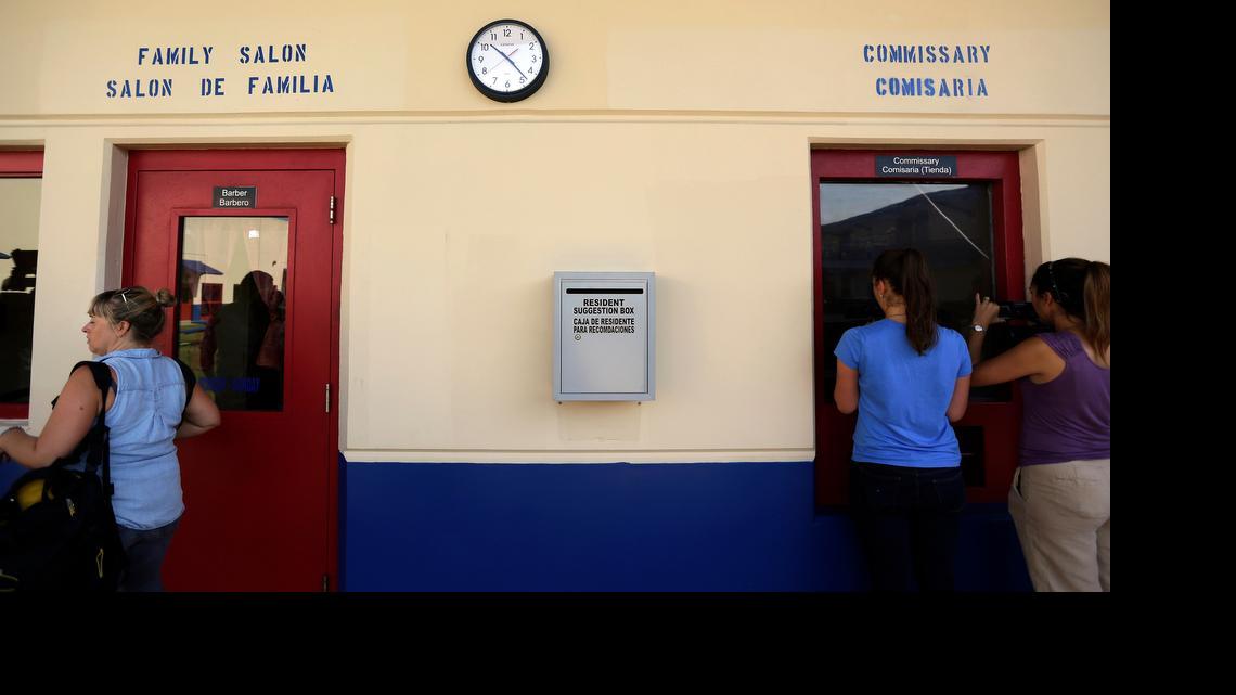 
FILE - In this July 31, 2014 photo, a suggestion box hangs on the wall outside of the hair salon and commissary at the Karnes County Residential Center, in Karnes City, Texas. Detaining immigrant women and children who may have fled violence in their home country “creates or exacerbates" psychological trauma, according to a complaint filed Tuesday by immigrant rights groups with the Department of Homeland Security. (AP Photo/Eric Gay, File)
