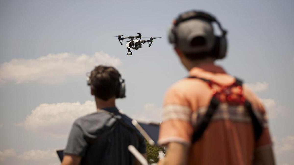 Mike Ferguson, left, chief pilot at AeroCine, and Jeff Brink, director of Flight-Ops and co-founder of AeroCine, operate a drone on June 1.