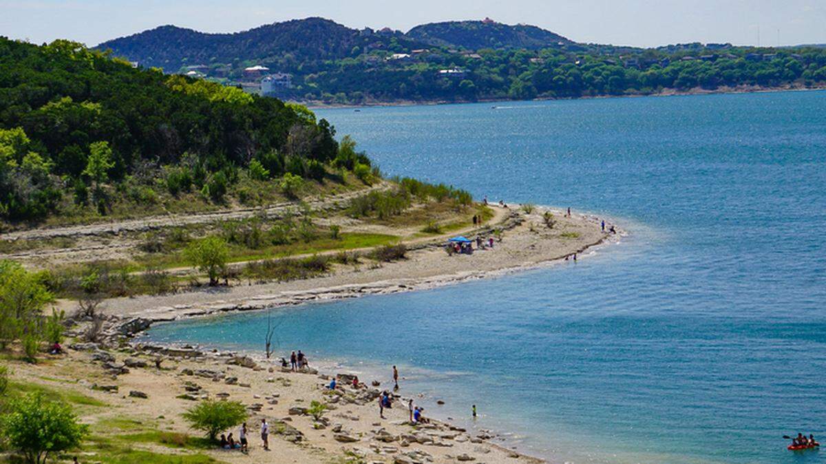 A witness swam from shore to rescue the 19-year-old who called for help before he went underwater and never resurfaced, Texas sheriffs say.