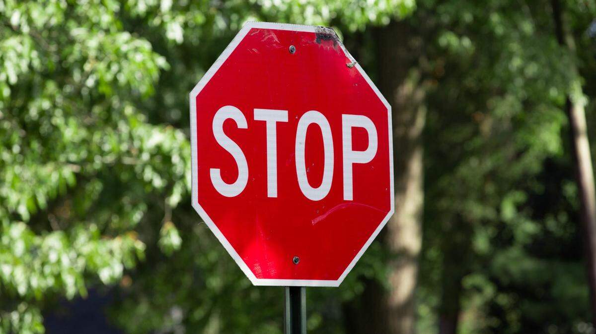 What are the rules for stopping at an intersection?