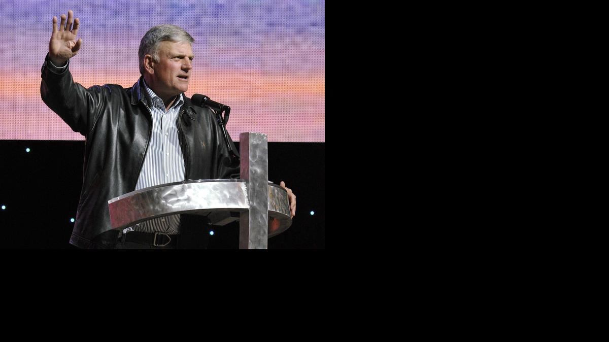 
FILE - In this Sept. 27, 2014 file photo, Christian evangelist Franklin Graham speaks in Erie, Pa. as part of a music and evangelism festival. On Thursday, Jan. 15, 2015, just days after announcing that a traditional Muslim call to prayer would echo from the historic chapel tower, Duke University changed course after being bombarded with calls and emails objecting to the plan. The original plan drew the ire of Graham, the son of the Rev. Billy Graham, who urged Duke alumni to withhold support because of violence against Christians that he attributed to Muslims. (AP Photo/Erie Times-News, Greg Wohlford)
