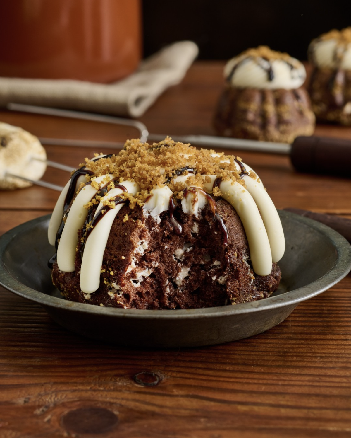 Nothing Bundt Cakes’ new s’mores cake is made with Hershey’s chocolate chips, graham cracker crumbs and mini marshmallows, the bakery chain said.