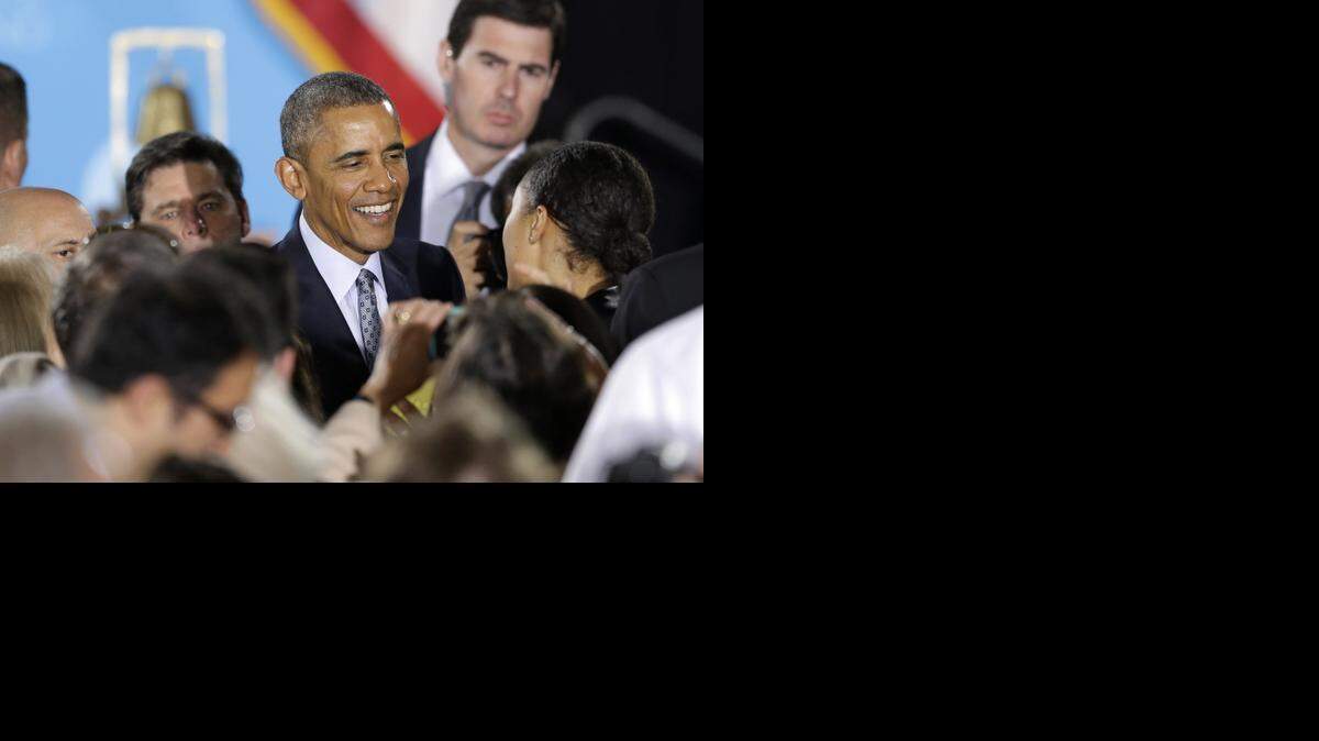 
President Barack Obama greets people after speaking at the City Club of Cleveland on Wednesday. Americans who don’t vote are typically younger, lower-income and likelier to be minorities, he said.


