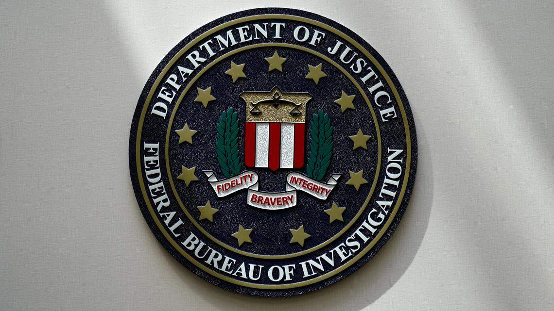 FILE - A former FBI agent was sentenced to prison after officials said he scammed a woman out more than $700,000 by making her believe she was on “secret probation.”