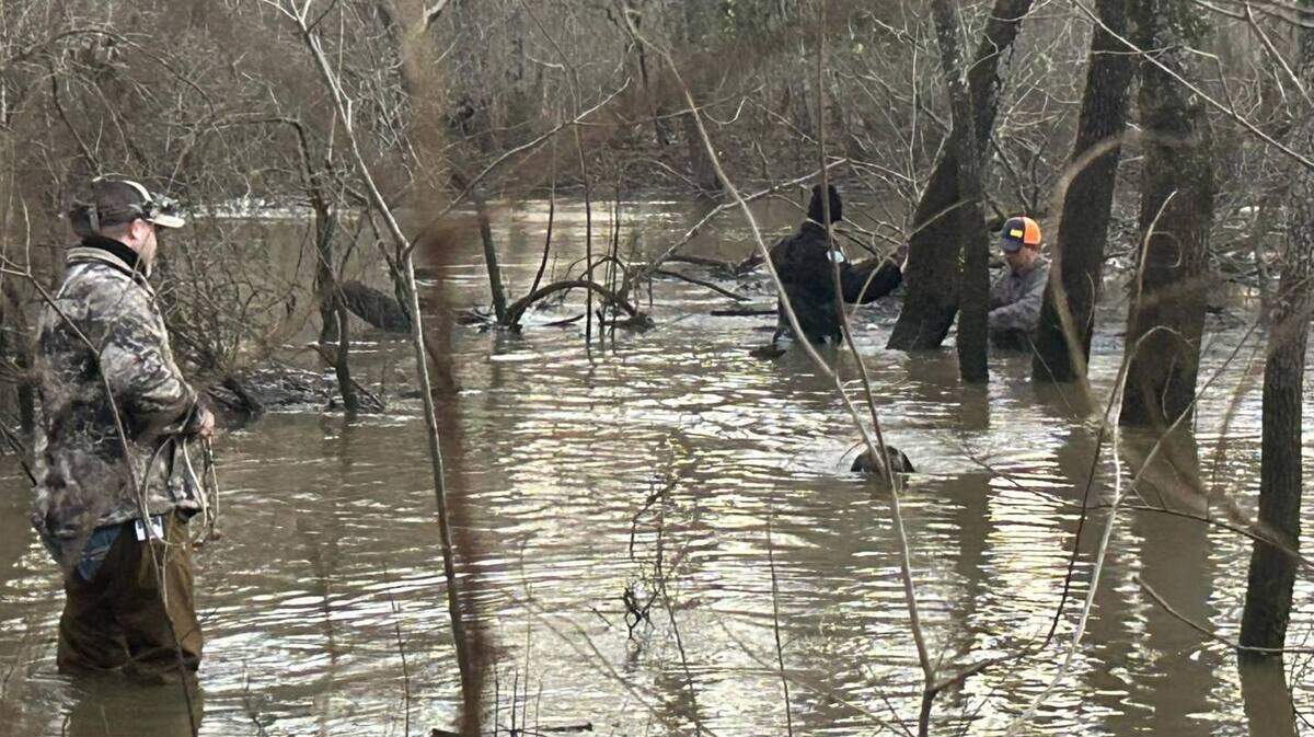 The hunters showed signs of hypothermia, Texas game wardens said.