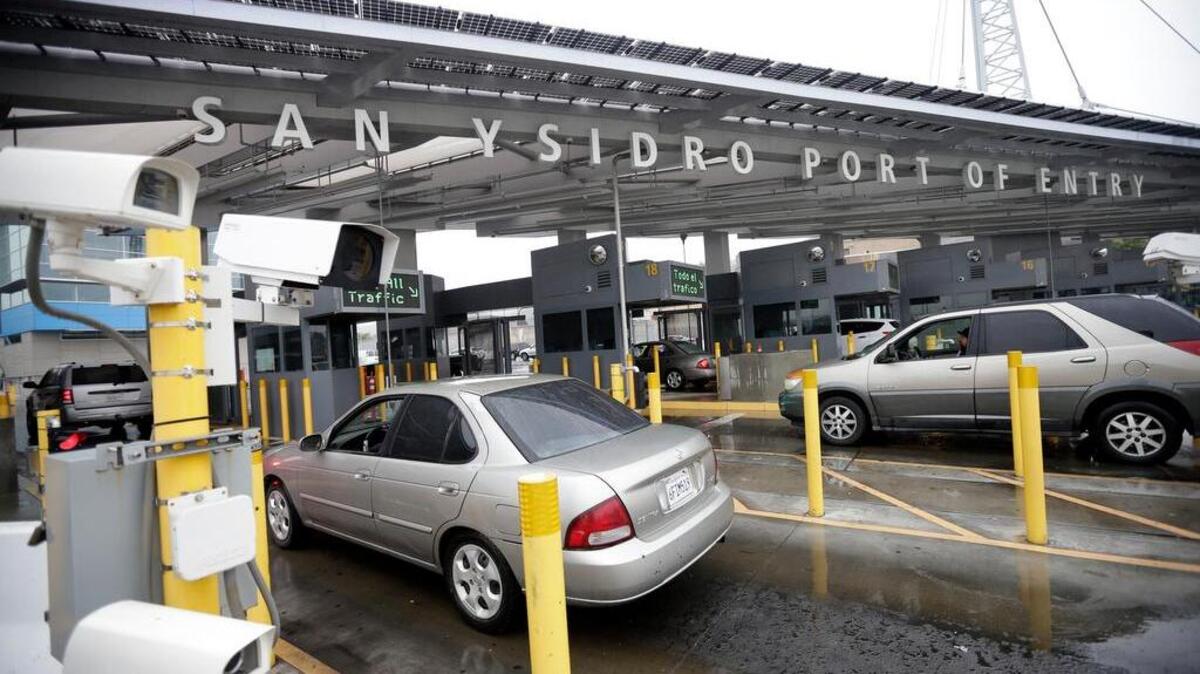 In this 2014 photo, cars wait to enter the United States from Tijuana, Mexico, through the San Ysidro port of entry in San Diego.
