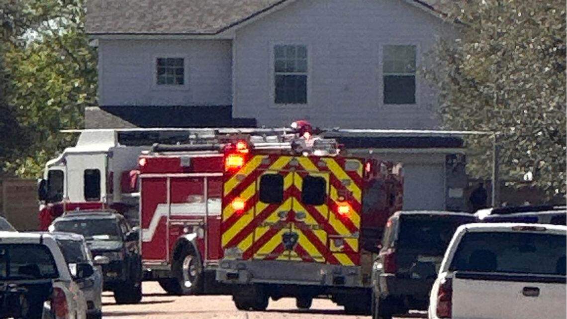 The shooting happened on a Harris County street between two sets of parents, authorities say.