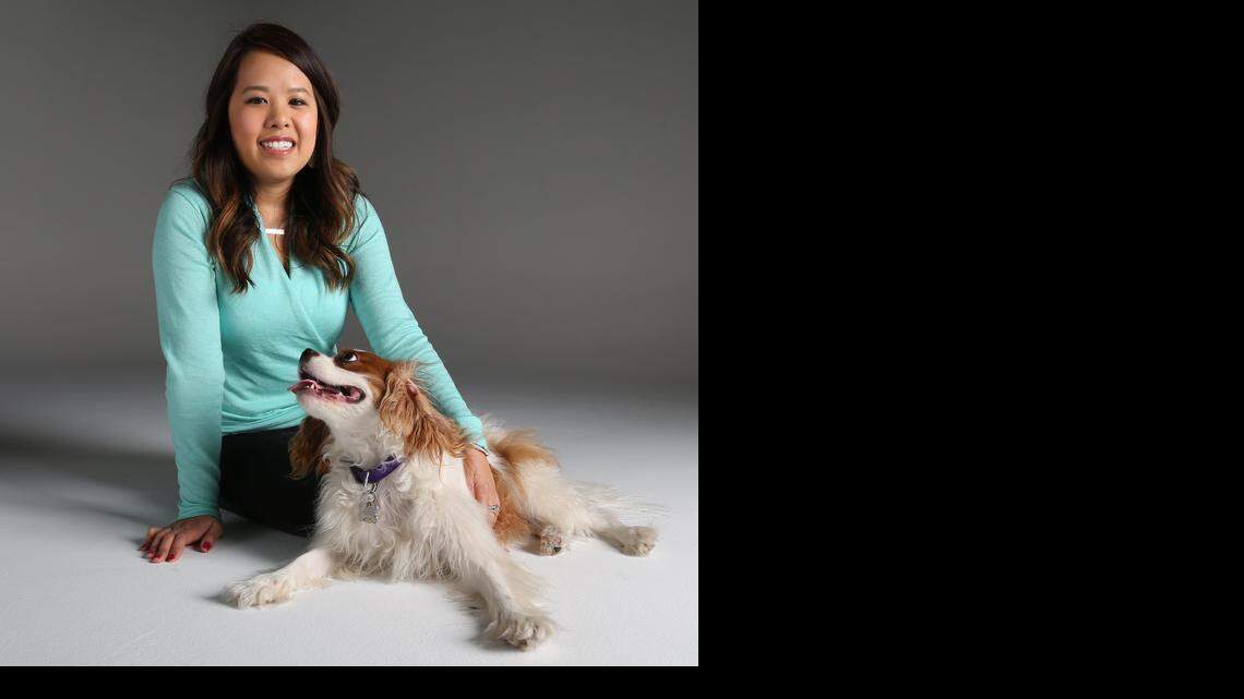 
Ebola survivor Nina Pham and her dog Bentley in the Star-Telegram studio.
