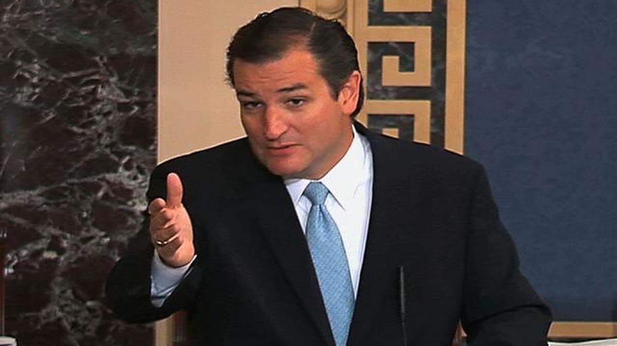 
Sen. Ted Cruz, R-Texas, speaks in opposition to the Affordable Health Care Act on the Senate floor on Sept. 24, 2013. Cruz now says he will sign up for coverage under the act.
