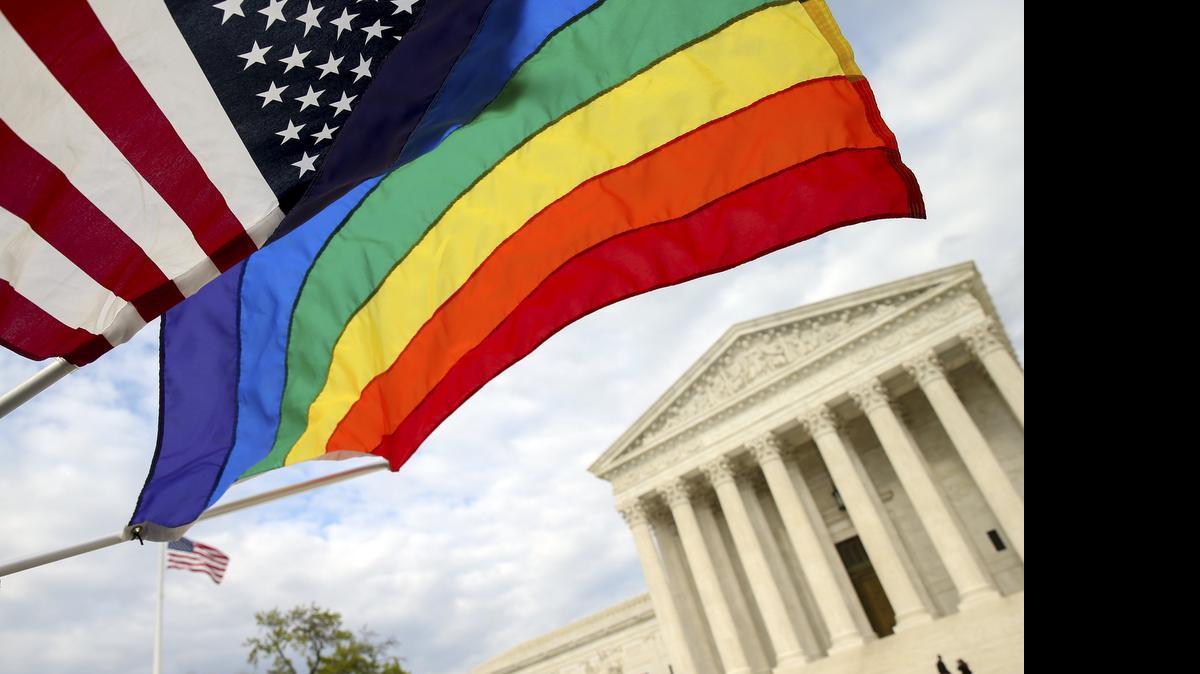 
An American flag and a rainbow colored flag flew recently in front of the Supreme Court in Washington.

