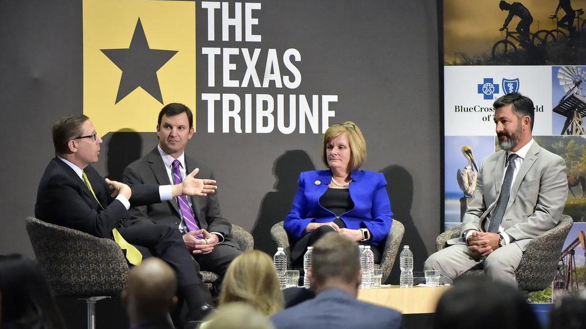 Evan Smith, editor in chief of The Texas Tribune, left, talks with three Fort Worth state representatives Tuesday, March 29, at TCU’s Brown-Lupton University Union. From left are state Rep. Craig Goldman and Rep. Stephanie Klick, both Republicans, and Rep. Ramon Romero, Jr., a Democrat.