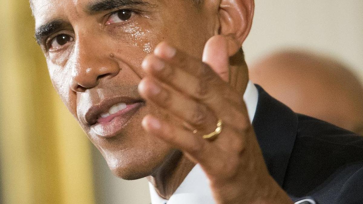 His cheek wet with tears, President Barack Obama President Barack Obama recalled the 20 first-graders killed in 2012 at Sandy Hook Elementary School, while speaking in the East Room of the White House in Washington, Tuesday, Jan. 5, 2016, about steps his administration is taking to reduce gun violence.