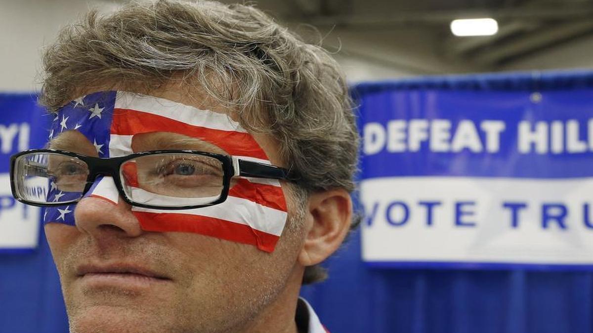 Delegate Douglas Marshall in the Donald Trump booth during the second day of the Republican Party of Texas state convention in Dallas Friday.