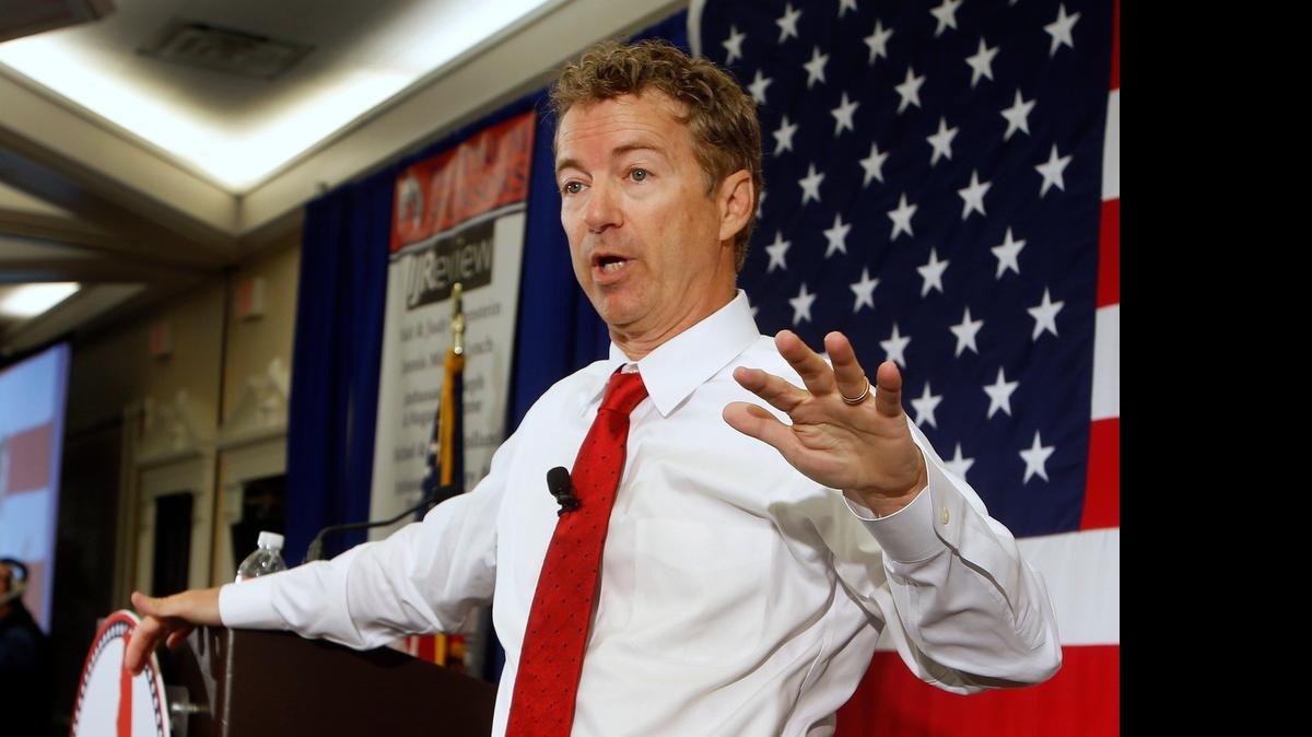 
Republican presidential hopeful Sen. Rand Paul, R-Ky., speaks at the Republican Leadership Summit Saturday, April 18, 2015, in Nashua, N.H. Paul’s Texas roots run deep. (AP Photo/Jim Cole)
