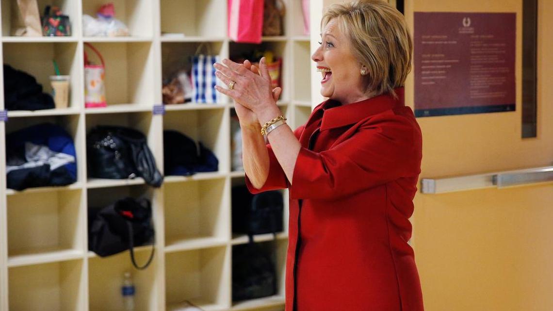 Live: Democratic presidential candidate Hillary Clinton reacts as she visits with Harrah's Las Vegas employees on the day of the Nevada Democratic caucus, Saturday, Feb. 20, 2016, in Las Vegas. (AP Photo/John Locher)