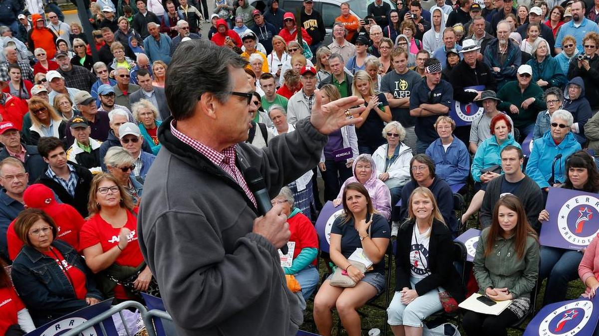 
FILE: In this Aug. 19, 2015 file photo, Republican presidential candidate, former Texas Gov. Rick Perry, speaks at the Iowa State Fair in Des Moines, Iowa. Perry’s cash-strapped presidential campaign is set to keep going in Iowa with just one paid staffer and some volunteers. (AP Photo/Paul Sancya, File)
