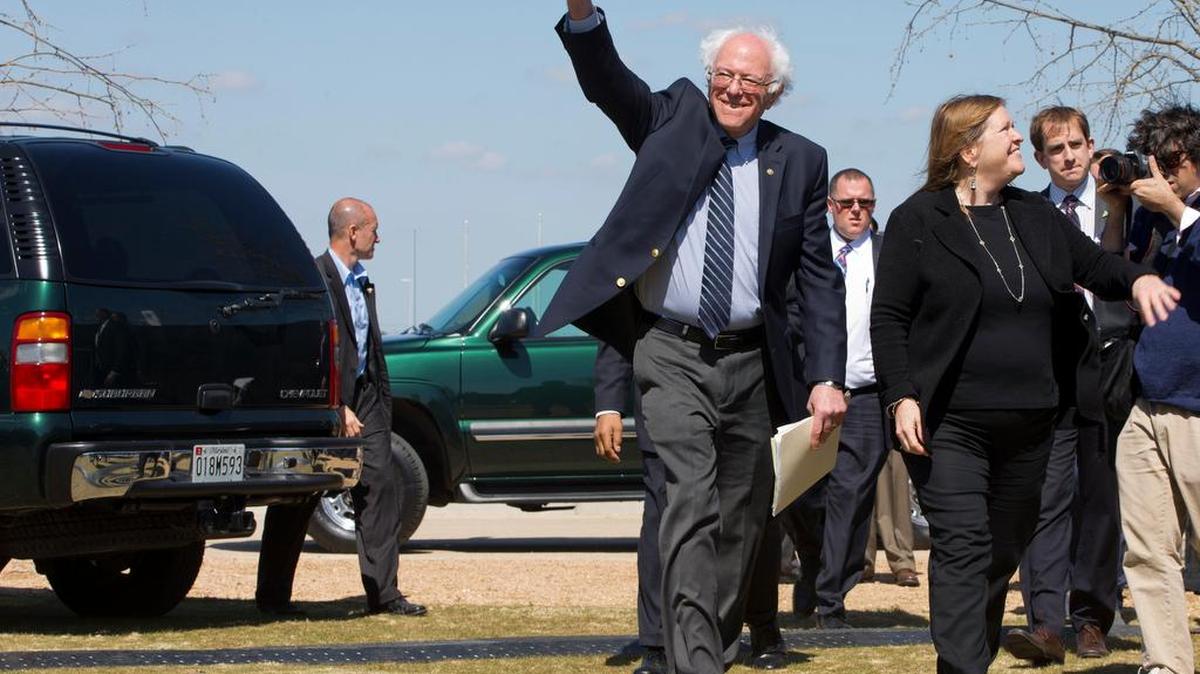 Live: Democratic presidential candidate Sen. Bernie Sanders, I-Vt., raises his fist in the air as he arrives with his wife Jane Sanders to speak at a campaign rally at the Circuit of the Americas in Austin, Texas, Saturday, Feb. 27, 2016. He later appeared in Grand Prairie. (AP Photo/Jacquelyn Martin)