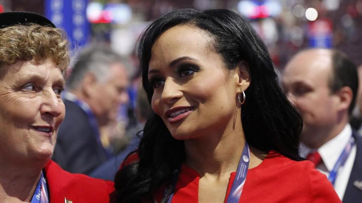 File: Republican Presidential Candidate Donald Trump spokeswoman Katrina Pierson, right, talks with delegates on the convention floor during the final day of the Republican National Convention in Cleveland, Thursday, July 21, 2016. (AP Photo/Carolyn Kaster)