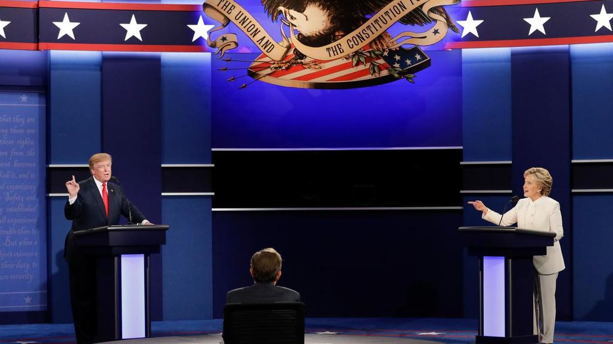 Live: Democratic presidential nominee Hillary Clinton exchanges views Republican presidential nominee Donald Trump during the third presidential debate at UNLV in Las Vegas, Wednesday, Oct. 19, 2016. (AP Photo/John Locher)
