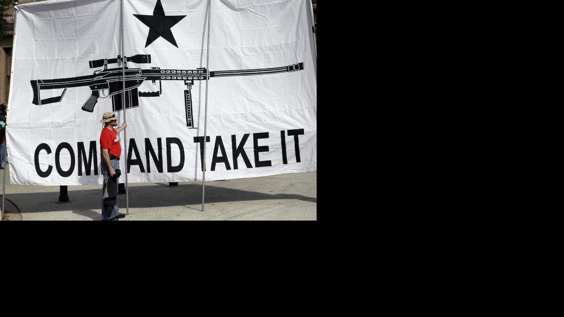 
A demonstrator helped hold a large “Come and Take It” banner at a rally in support of open carry gun laws at the Texas Capitol late last month.


