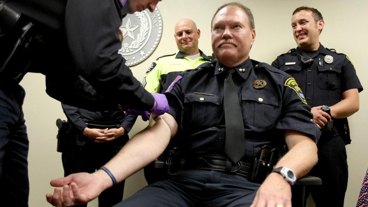 Former Dalworthington Gardens police chief Bill Waybourn has been endorsed in the GOP primary by former Gov. Rick Perry, partially for his work on the No Refusal drunken driver program. In this 2012 photo he demonstrates how blood is drawn from suspected drunk drivers.