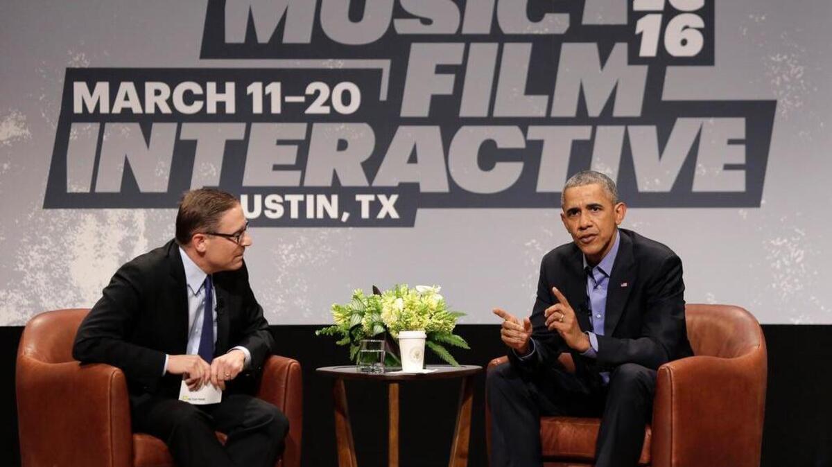 President Barack Obama talks with Evan Smith, editor of the Texas Tribune, during the South by Southwest Interactive opening session Friday in Austin.
