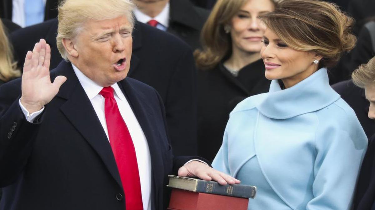 Donald Trump is sworn in as the 45th president of the United States as Melania Trump looks on during the 58th Presidential Inauguration at the U.S. Capitol in Washington on Friday.