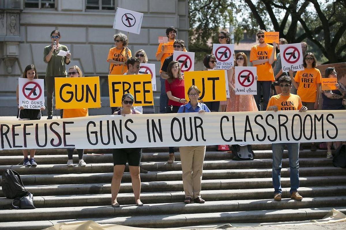 Students at the University of Texas campus protested the state’s plan to allow students with concealed handgun licenses to legally carry on campus. The law for community colleges goes into effect Aug. 1.