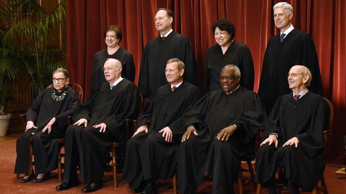 Members of the U.S. Supreme Court pose for a group photograph at the Supreme Court building on June 1. Front row. Seated from left, Associate Justice Ruth Bader Ginsburg, Associate Justice Anthony M. Kennedy, Chief Justice of the United States John G. Roberts, Associate Justice Clarence Thomas, and Associate Justice Stephen Breyer; and standing from left, Associate Justice Elena Kagan, Associate Justice Samuel Alito Jr., Associate Justice Sonia Sotomayor, and Associate Justice Neil Gorsuch.