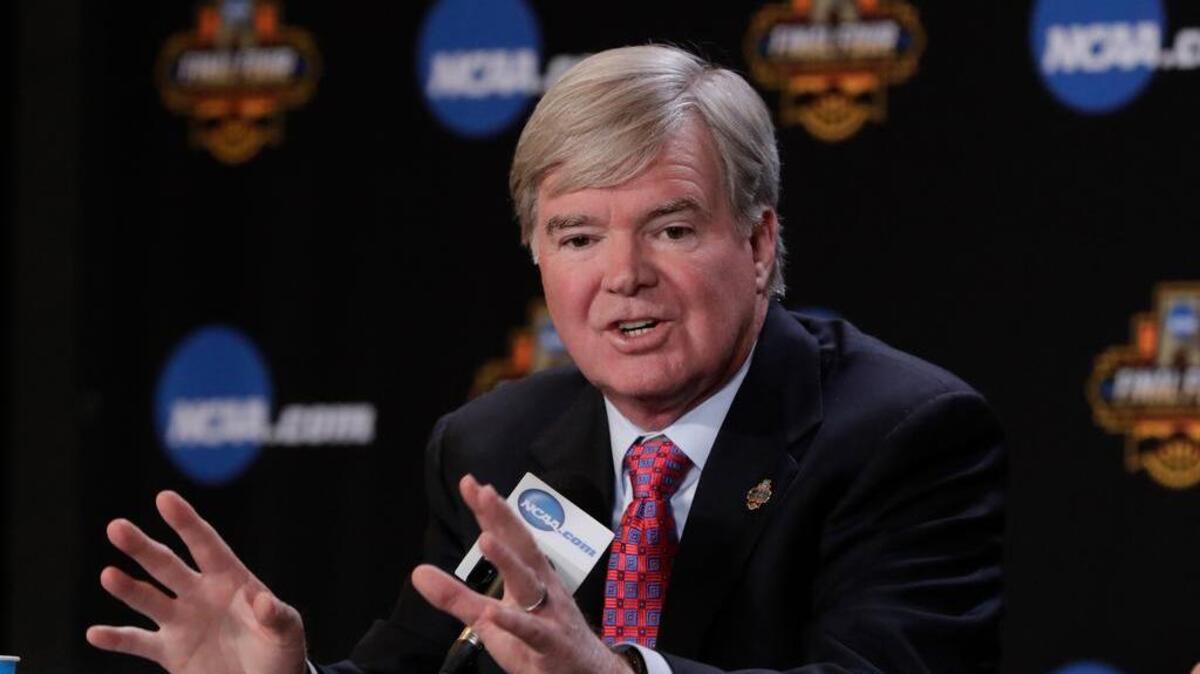 NCAA President Mark Emmert answers a question at a news conference in Glendale, Ariz. The NCAA says it will consider North Carolina as a host for championship events again after the state rolled back a law that limited protections for LGBT people.