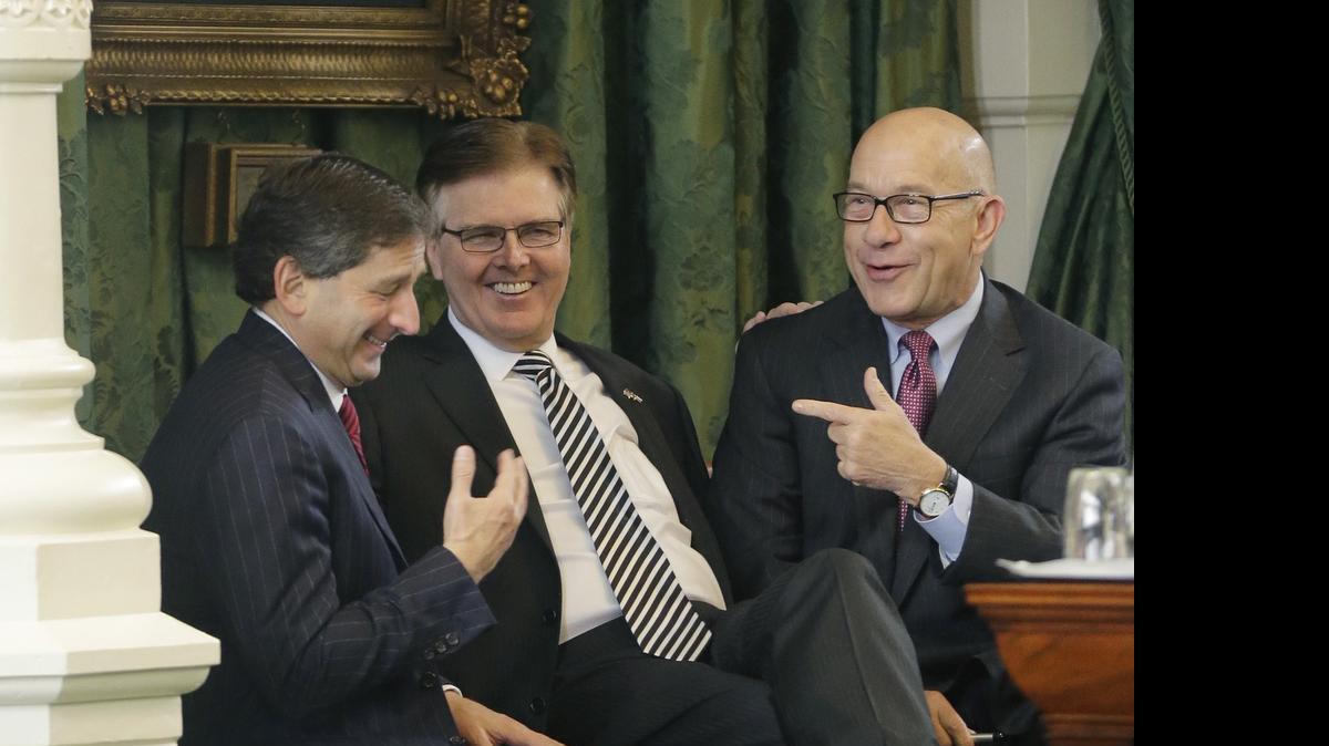
Texas Lt. Gov. Dan Patrick, center, shares a laugh with Sen. Kevin Eltife, R-Tyler, left, and Sen. John Whitmire, right, in the Senate Chambers, Friday, May 22, 2015, in Austin, Texas.
