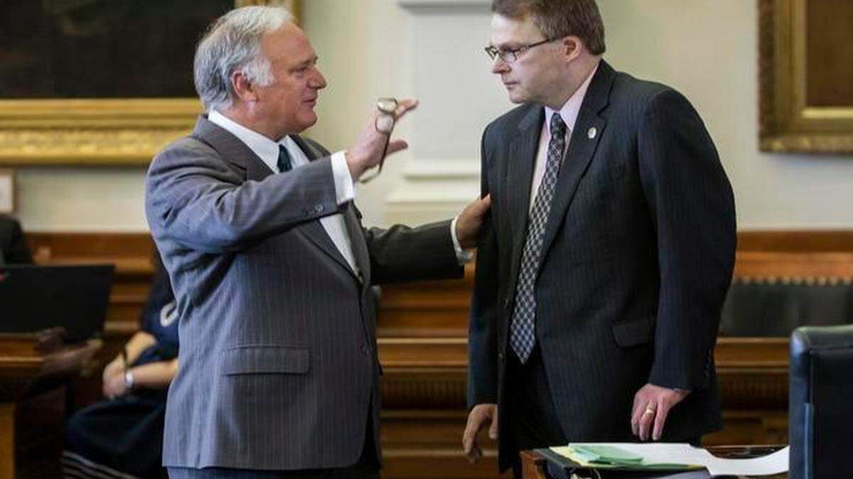 
State Sen. Kirk Watson, left, D-Austin, on Wednesday debates language in a bill by state Sen. Brian Birdwell, R-Granbury, right. Birdwell’s bill requires public colleges and universities to allow concealed handguns on campus — a policy opposed by many higher education leaders.
