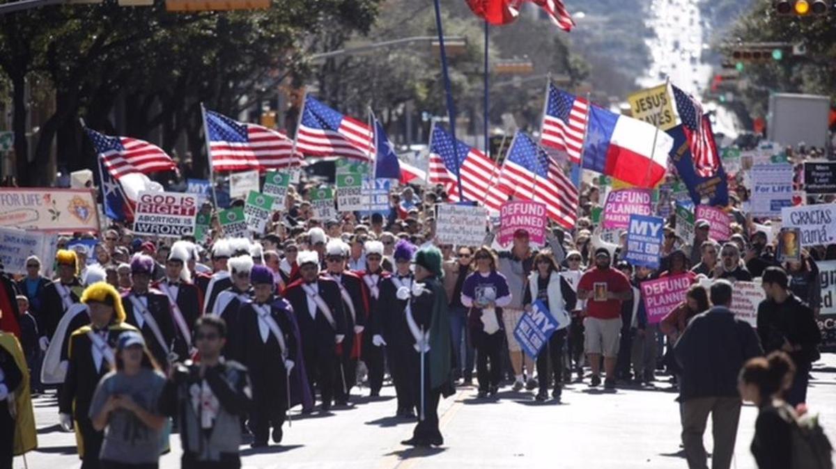 Anti-abortion demonstrators march up Congress Avenue toward the Capitol in Austin for the Texas Rally for Life on Saturday.