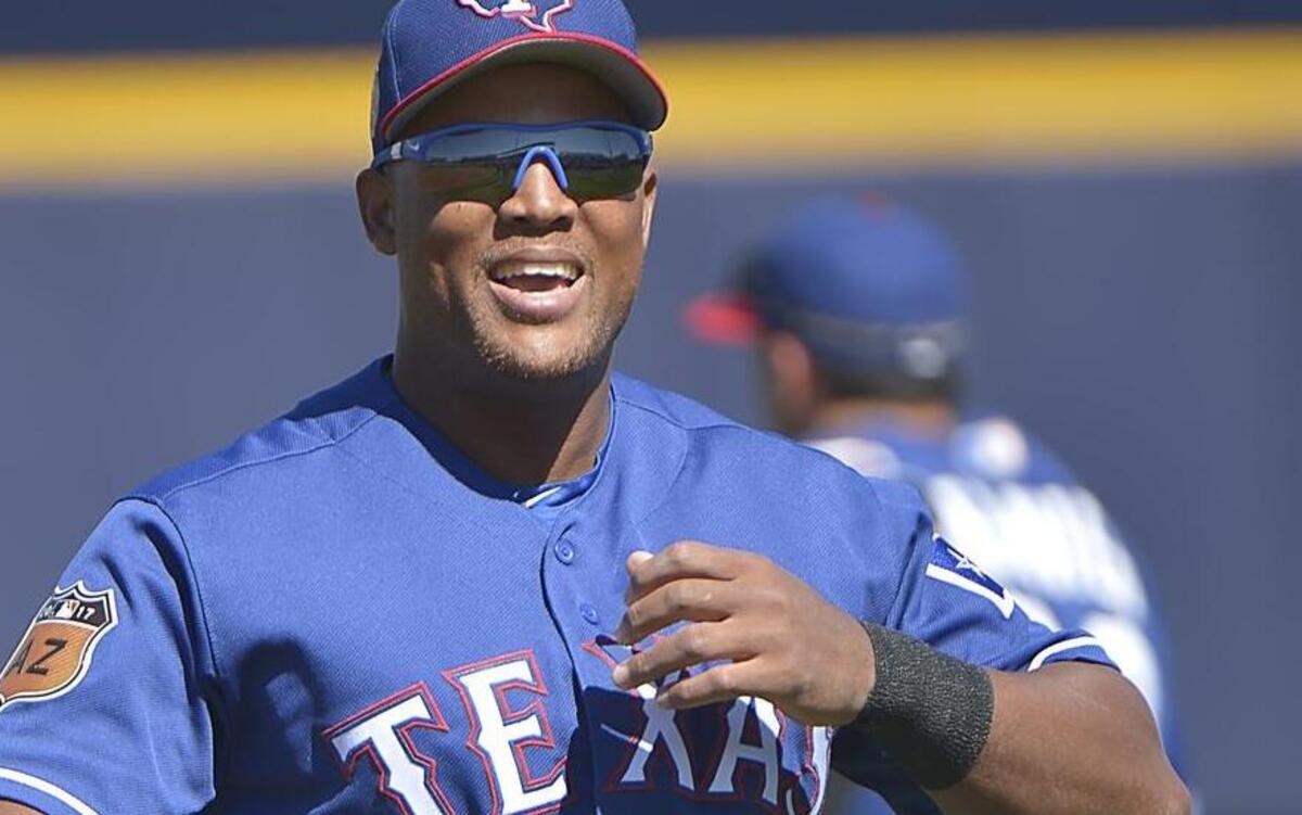 Major League Baseball begins Sunday. In this photo, Texas Rangers third baseman Adrian Beltre (29) warmed up before a game in Peoria, AZ.