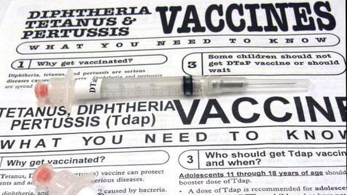 
Detail shot of an adult dose, bottom and child dose, top, of Pertussis (Tdap) vaccine for whooping cough photographed on fact sheets at a shot clinic provided by the Immunization Collaboration of Tarrant County/ 
