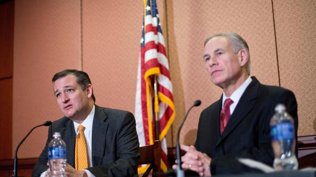 Republican presidential candidate Sen. Ted Cruz, R-Texas, left, and Texas Gov. Greg Abbott, right, speak about the resettlement of Syrian refugees in the U.S., during their joint news conference on Capitol Hill in Washington, Tuesday, Dec. 8, 2015. 