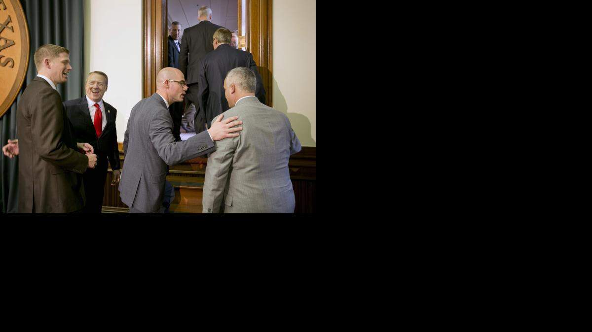 
From left to right, Rep. Matt Krause, Rep. Ron Simmons, Rep. Dennis Bonnen and Rep. Dwayne Bohac walk away after Bonnen announced his plan for a sales tax cut at the Capitol in Austin, Texas, on Wednesday April 8, 2015. 
