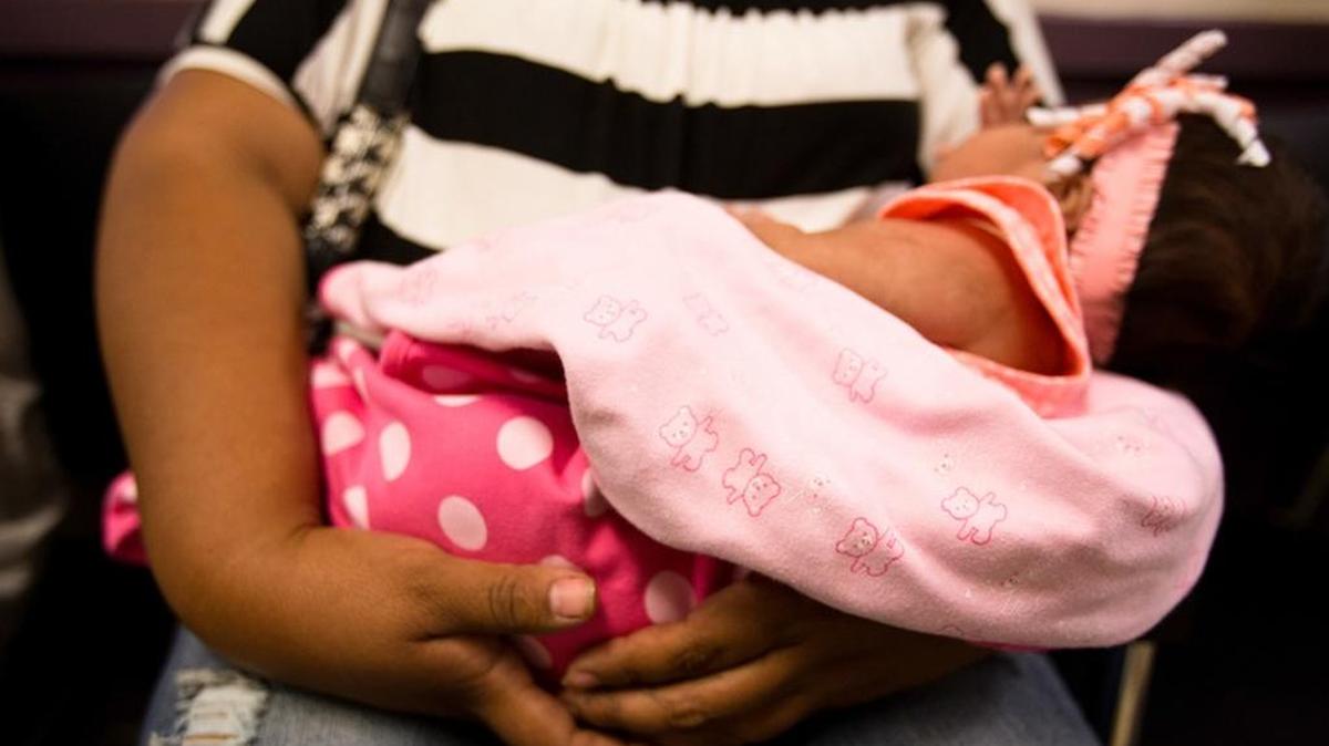 Patients wait to be seen at the People's Community Clinic in Austin, which provides state-subsidized women's health services to low-income women, in July 2014.