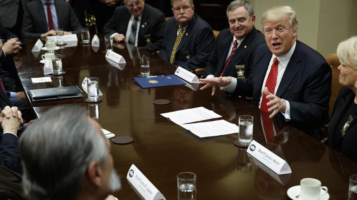 President Donald Trump speaks during a meeting with county sheriffs in the Roosevelt Room of the White House in Washington on Tuesday.