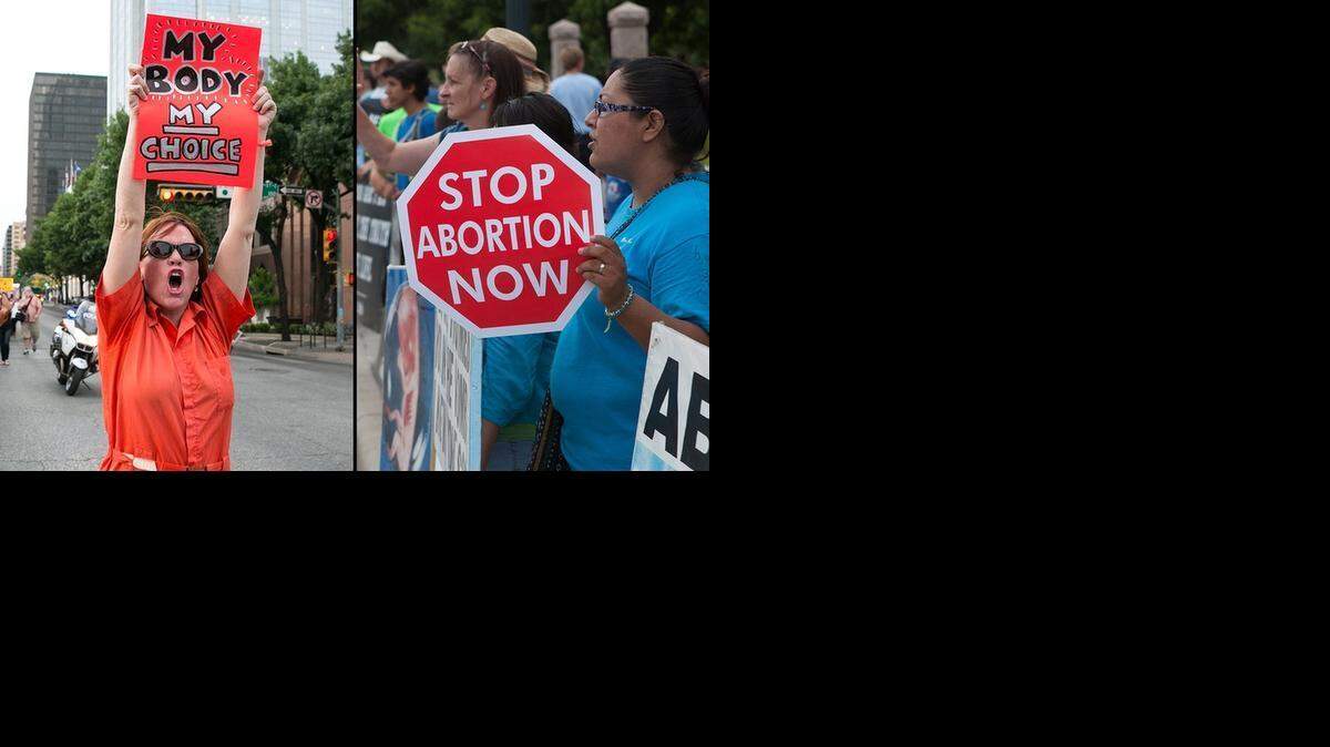 
Protesters demonstrate on different sides of the abortion issue.
